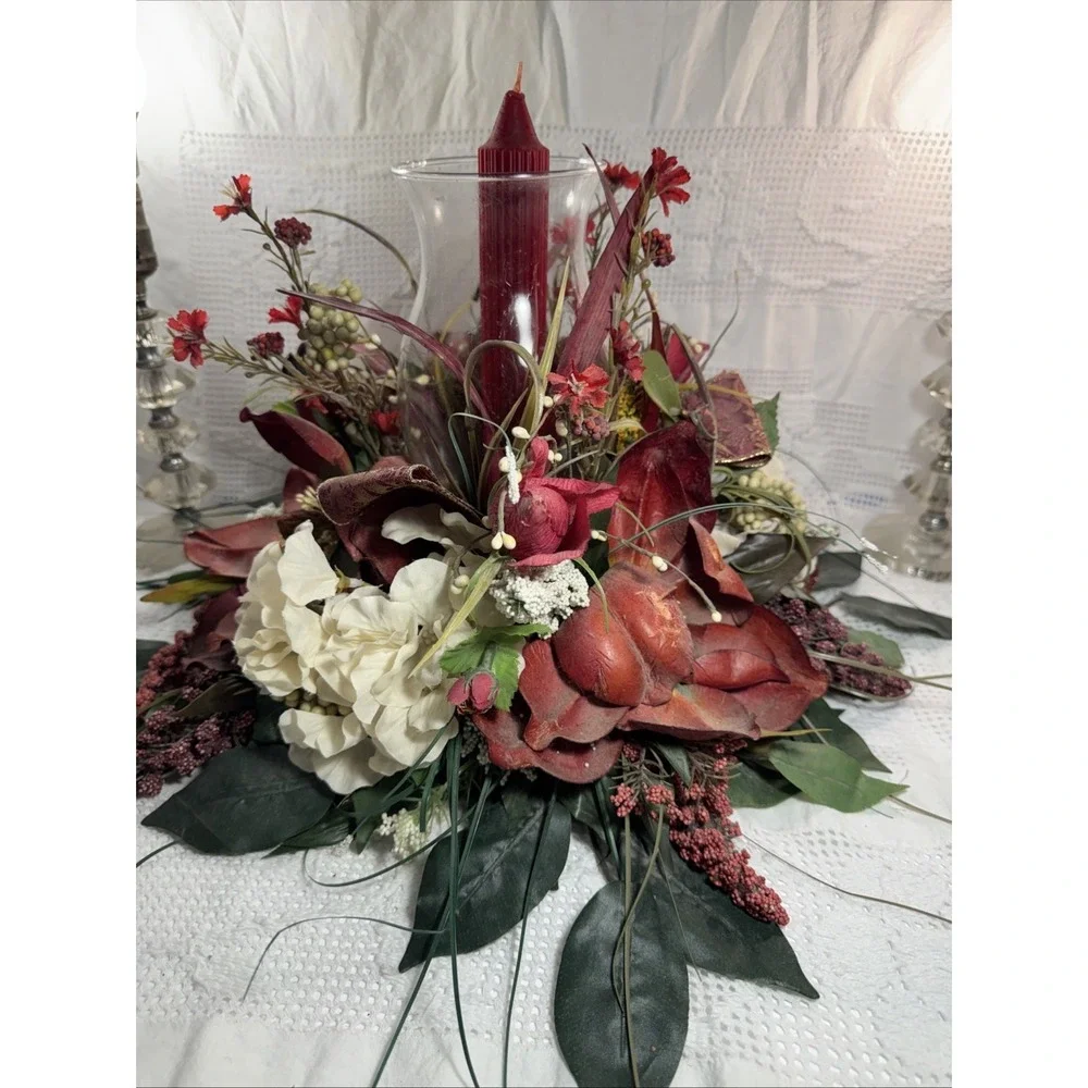 Artificial Fall Themed Floral Centerpiece Surrounding A Glass Vase